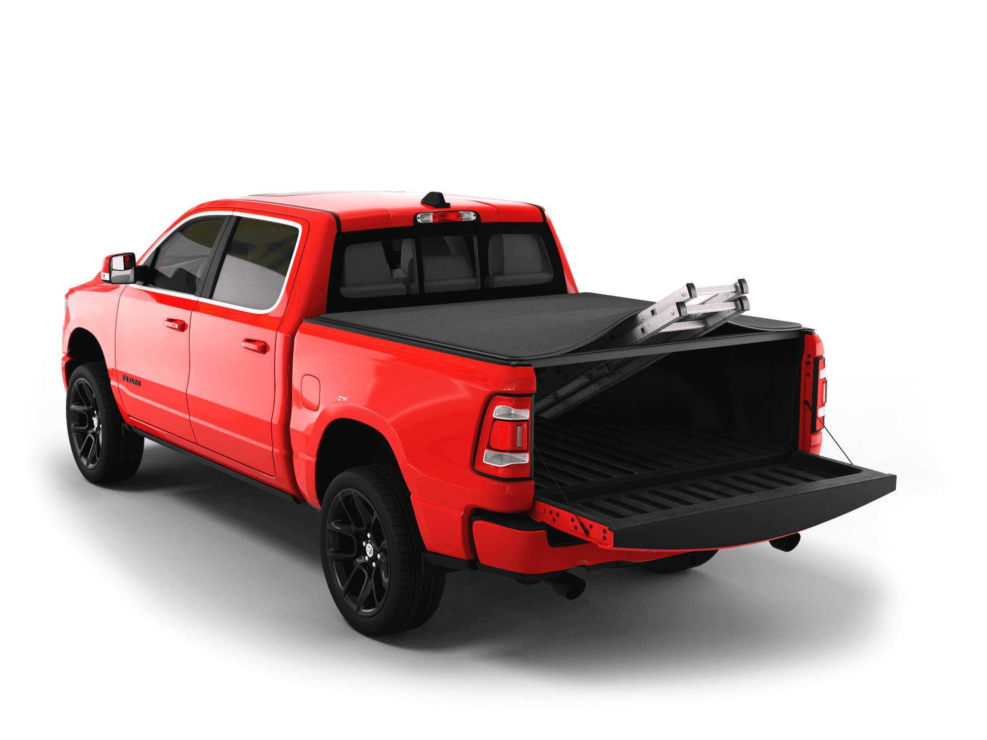 Red Ram 2500 with Sawtooth Stretch expandable tonneau cover rolled up at cab