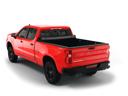 Red Chevrolet Silverado 1500 / GMC Sierra 1500 with Sawtooth Stretch expandable soft roll up tonneau cover with ladder and open tailgate 