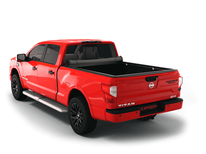 Red Nissan Titan with Sawtooth Stretch expandable soft roll up tonneau cover with ladder and open tailgate 