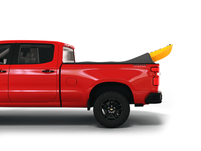 Red Chevrolet Silverado 2500HD / 3500 HD / GMC Sierra 2500HD / 3500HD with yellow kayak under sawtooth stretch truck bed cover