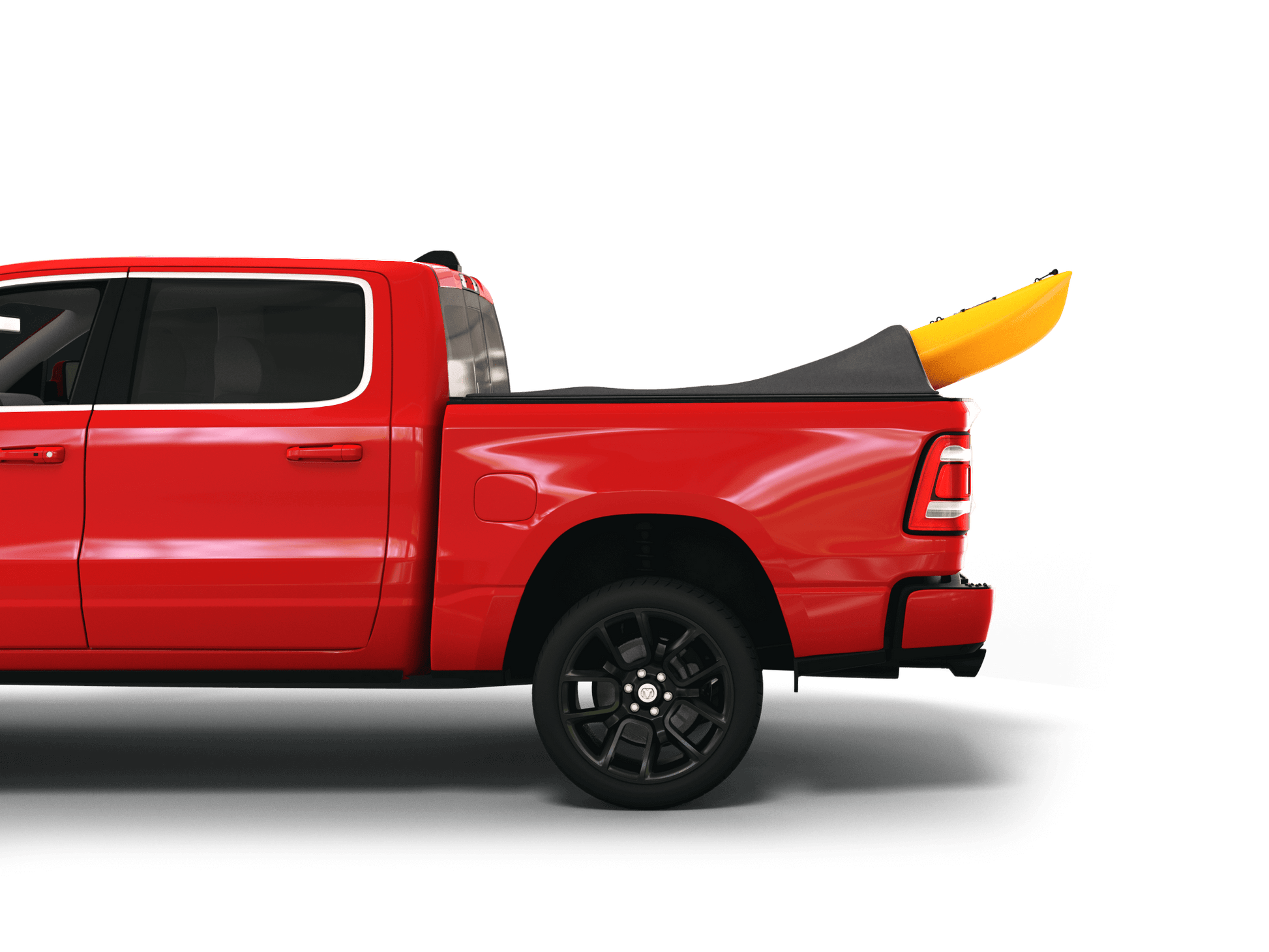 Red Ram 2500 with yellow kayak under sawtooth stretch truck bed cover