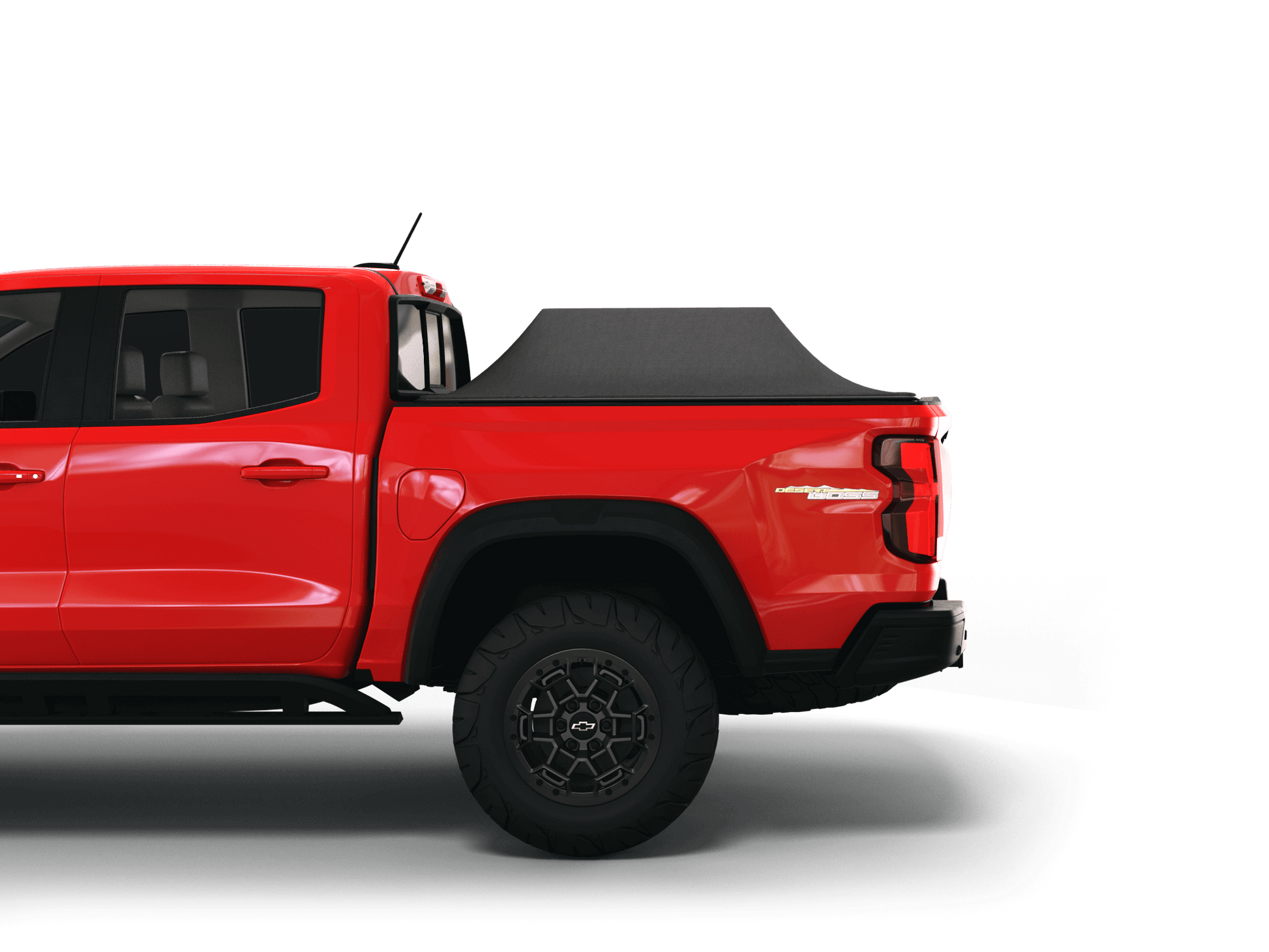 Red Chevrolet Colorado / GMC Canyon with Sawtooth Stretch tonneau cover expanded over cargo load