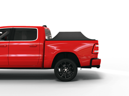 Red Ram 2500 with Sawtooth Stretch tonneau cover expanded over cargo load