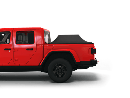 Red Jeep Gladiator with Sawtooth Stretch tonneau cover expanded over cargo load