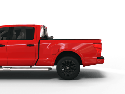 Red Nissan Titan with Sawtooth Stretch expandable pickup truck bed cover rolled up at cab