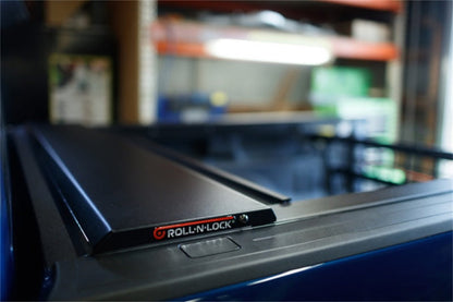 ROLL-N-LOCK E-Series Hard Power Retractable Tonneau Cover 76.3 In. Fits 19-24 Ram 1500 No RamBox